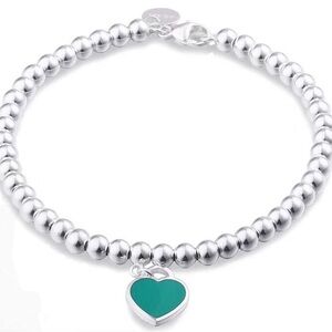 Tiffany & Co. Silver Bracelet with Teal Heart Charm